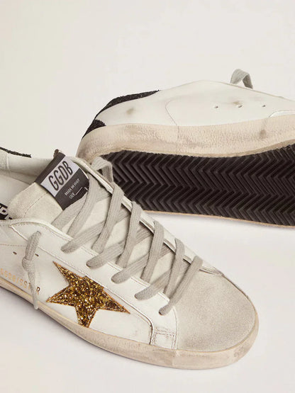 Super-Star femme en cuir nappa avec étoile à paillettes dorées et contrefort à paillettes noires